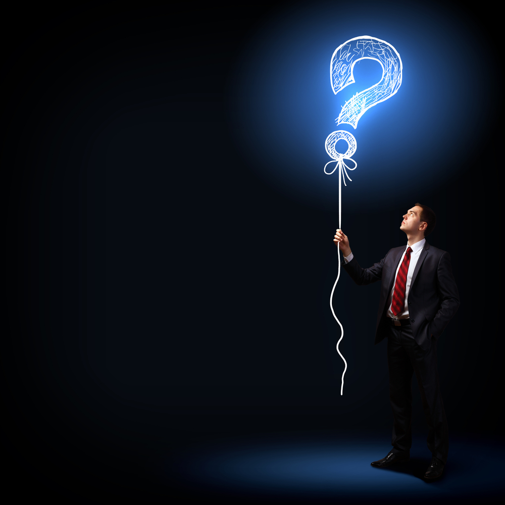 Image of businessman in black suit against dark background Image of businessman in black suit against dark background